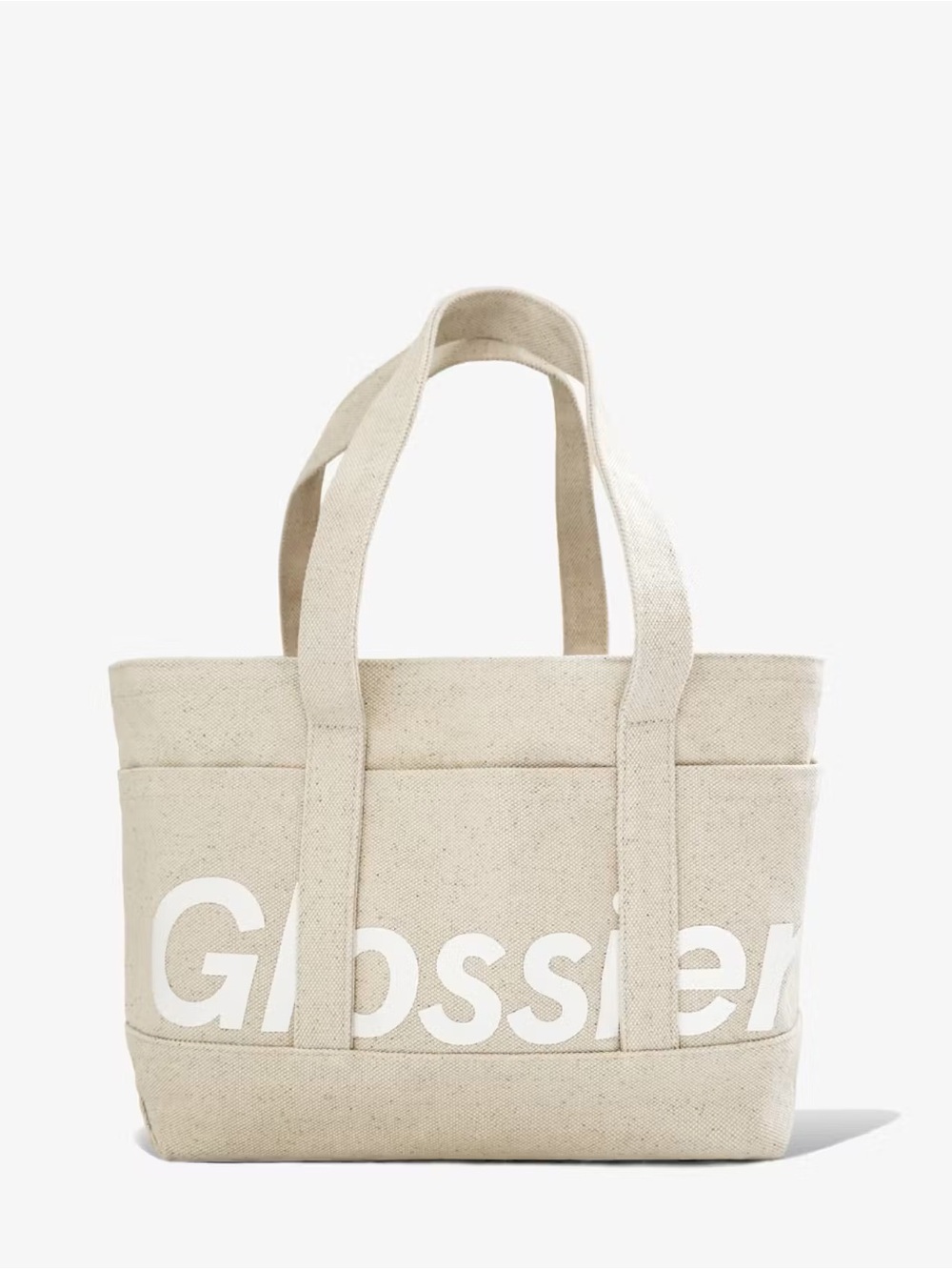 Glossier beige canvas tote with white logo